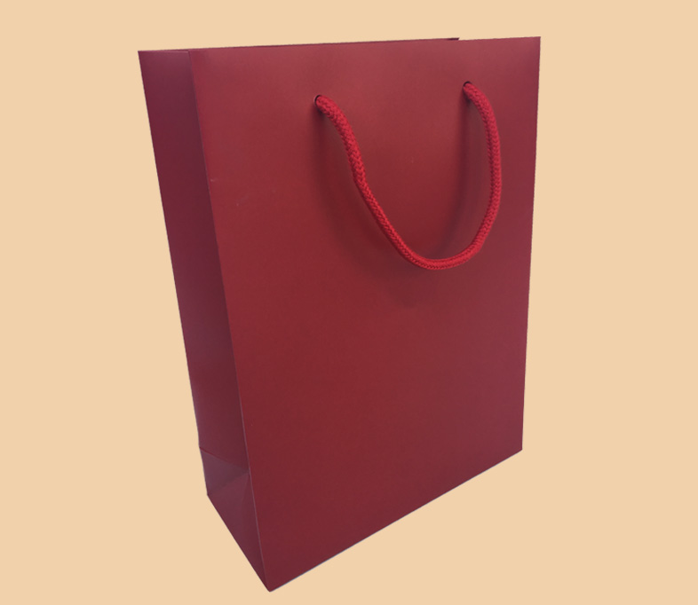 Red cardboard packing bag