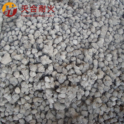 High iron and high calcium synthetic sand