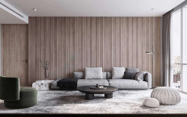 沙发背景是客厅的重要部分，人们起居焦点，极简的木饰面搭配柜类，反映出主人的生活品质。